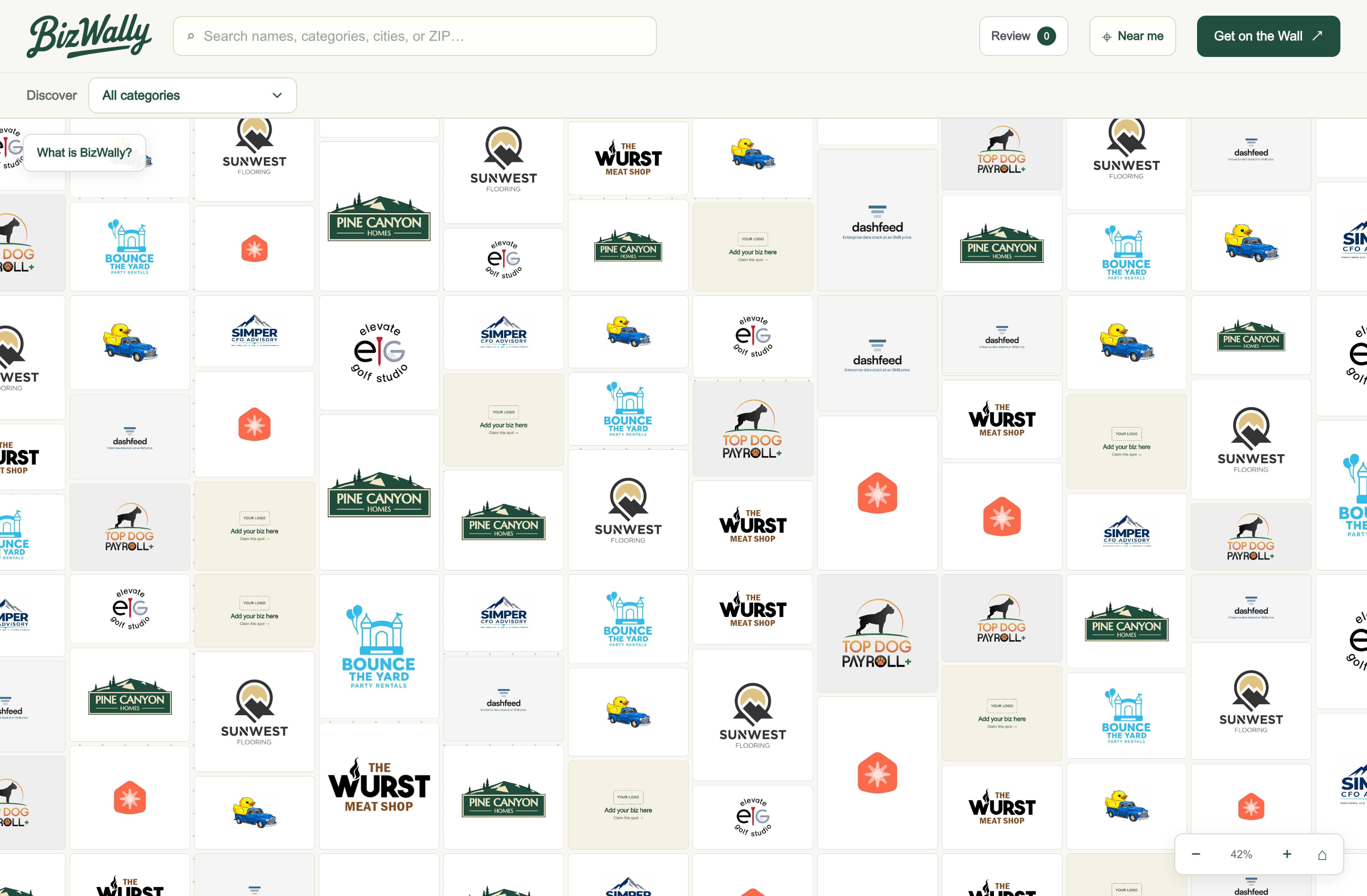 BizWally local business discovery interface with searchable business tiles and nearby controls
